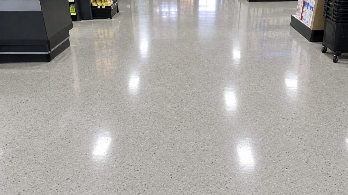 Polished floor in a convenience store aisle