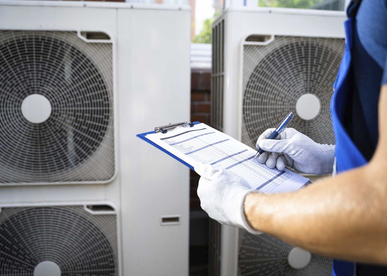 Rooftop air conditioning unit being serviced